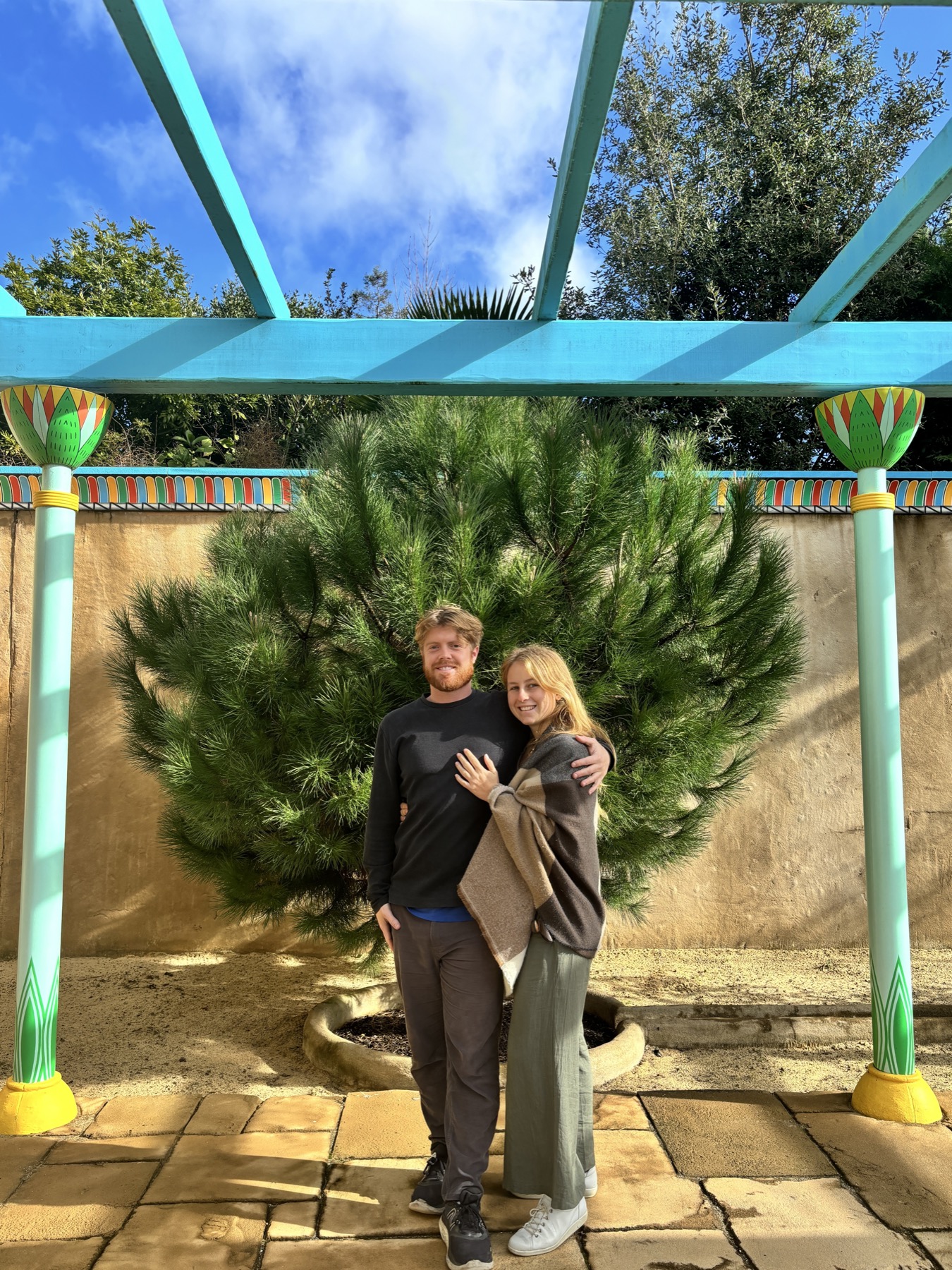 Carl Meyer in front of a pine tree